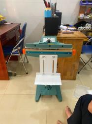 Máy hàn miệng túi dập chân PFS-800 có giá đỡ